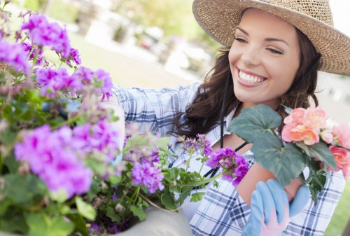 Gardener starting work in a Lee garden